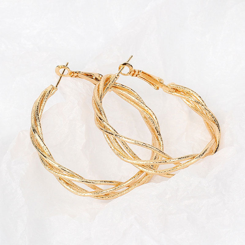 Women's Twisted Design Large Hoop Earrings.