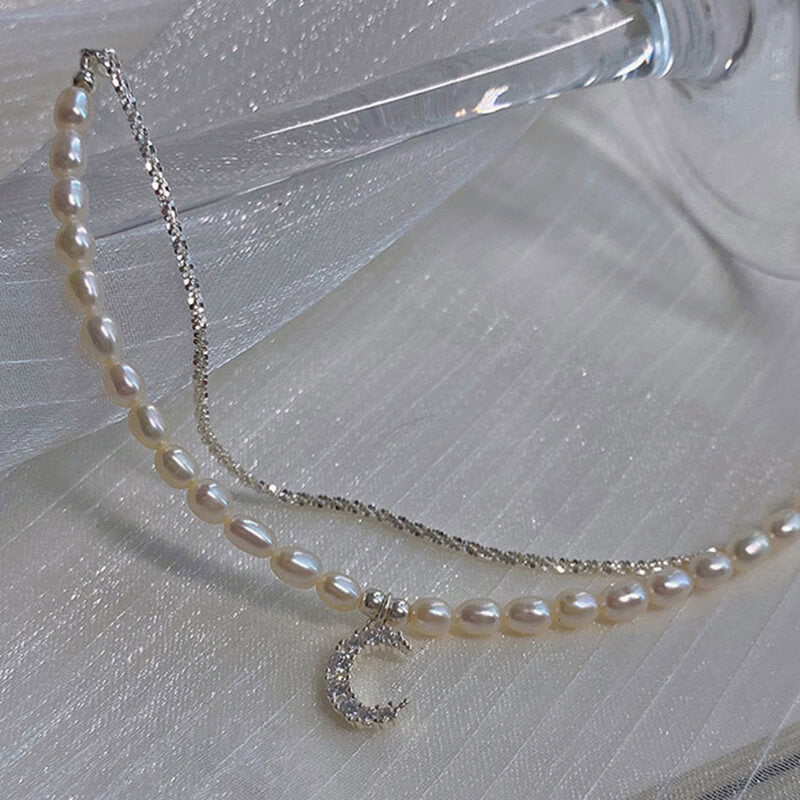 Faux Pearl & Moon Pendant Bracelet.