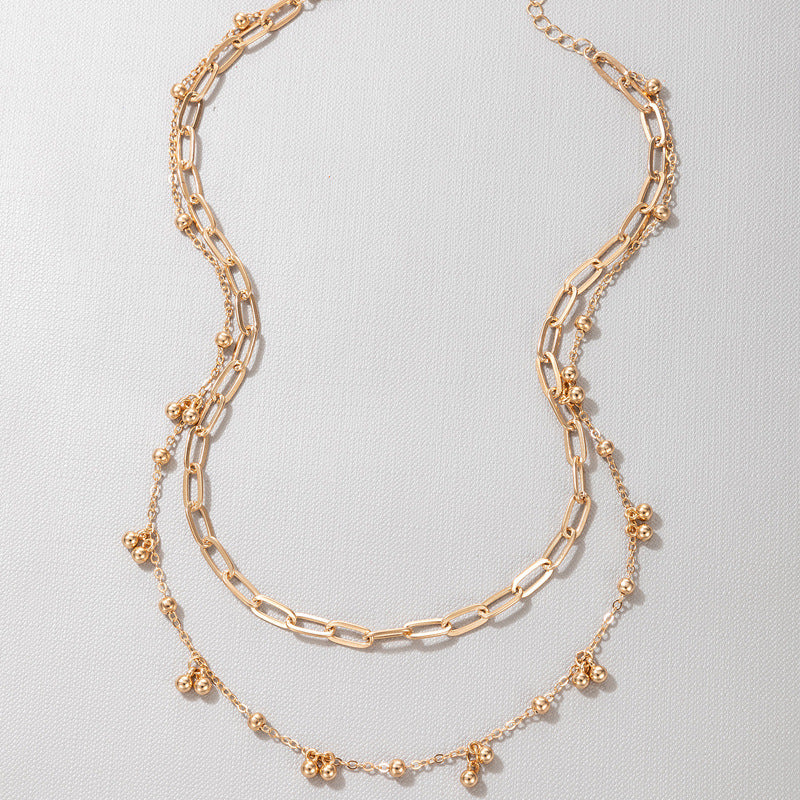 Bell Design Pendant Gold Color Multilayer Necklace.