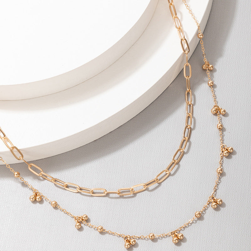 Bell Design Pendant Gold Color Multilayer Necklace.